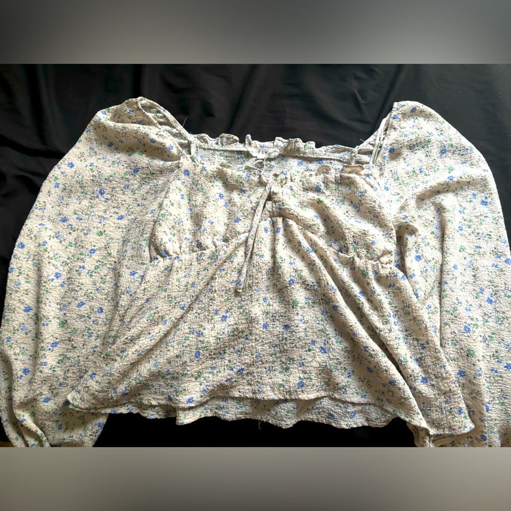 Long sleeve floral top.